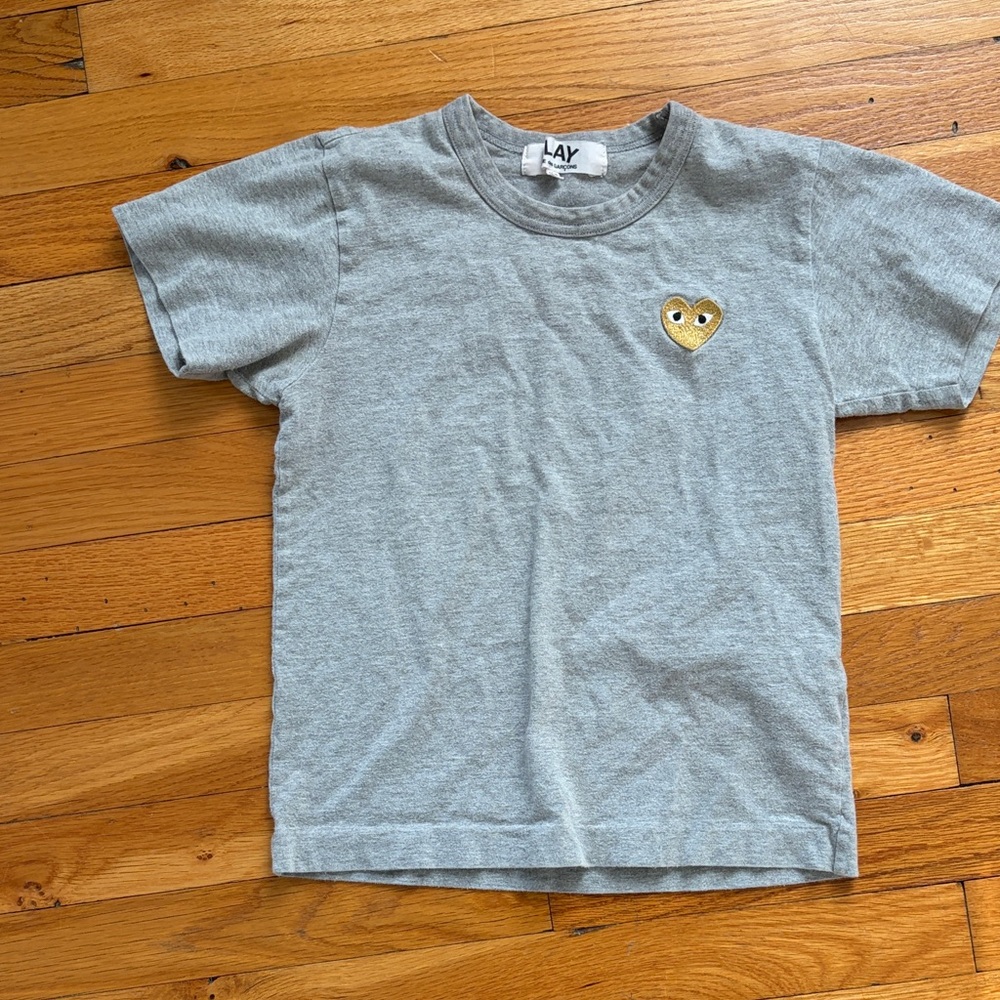 Comme des Garcons Heather Gray Tee with Gold Emblem